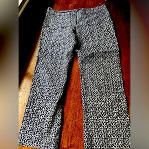 Erica Taylor ankle pants. Navy blue flowers over  white.